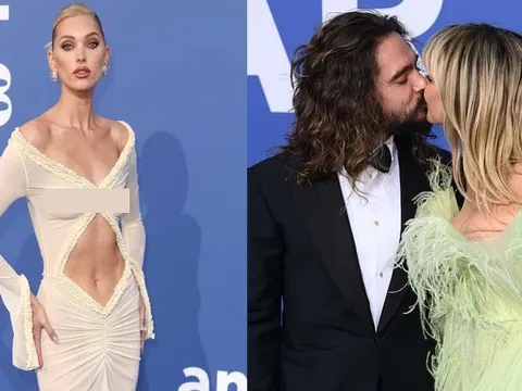 Thiên thần nội y lộ vòng một, Heidi Klum hôn chồng trên thảm xanh