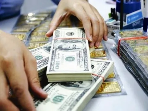 Vàng và USD hạ nhiệt sau loạt biện pháp điều hành